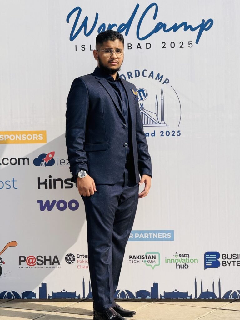 Ibrahim Tariq at the WordCamp Islamabad 2025 sponsor wall
